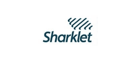 Logo with the text "Sharklet" and a design resembling shark skin texture above the text.